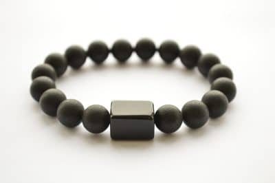Baltic amber black bracelet with polished Cube from front